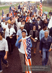 Martin Luther King leads the Selma to Montgomery march as it approaches it's finale in Montgomery, Alabama. 1965
