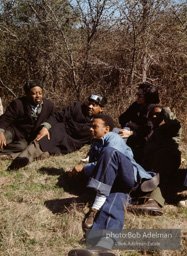 MLK pausing with his aides during the Selma to Montgomery march, Alabama, 1965