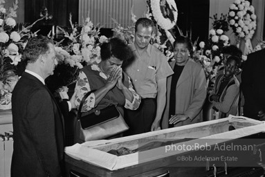 Mourners view Martin Luther King's open casket.Atlanta, GA, 1968