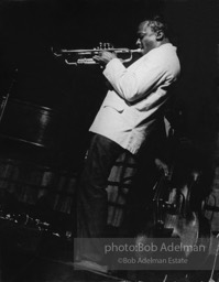 Nonchalantly,  the jazz great Miles Davis turns away from the audience at the Village Vanguard,  New York City 1959