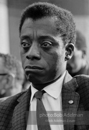 James Baldwin mourns at a memorial service for the four girls killed in Birmingham in the 16th Street Baptist Church bombing. New York City, 1963.