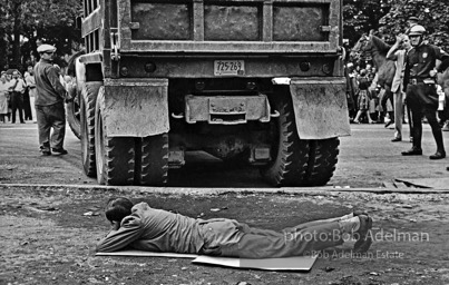 Stop action: Determined to end unfair hiring practices, two protestors put their lives on the line, closing down a construction site at the Downstate Medical Center, Brooklyn, New York City.  1963