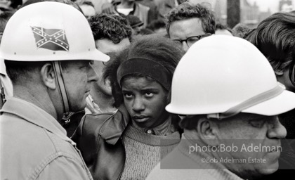 Hard stare: A young woman penned in by Sheriff Jim Clark’s posse glares as her fellow demonstrators chant, “No more Jim Clark over me,”  Selma,  Alabama.  1965