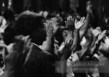 Audience responding to Martin Luther King speaking at the 16th street Baptist Church. Birmingham, Alabama, 1963.