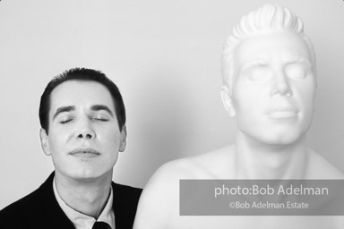 Artist Jeff Koons poses with a sculpture, self-portrait at the Sonnabend Gallery, New York City, 1991. The sculpture was recently featured at his one-man show at the Palace of Versailles.