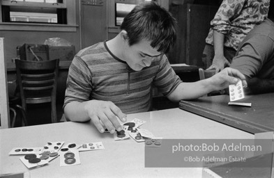 Ex Mental Patients in Halfway House working, sorting buttons. as part of rehabliitation program. Brooklyn,  NY, 1972.