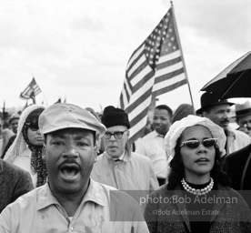 King and Coretta Scott King arriving outside Montgomery on the fourth day of the Selma to Montgomery March. Alabama Route 80. 1965.