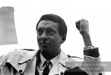 King led anti-Vietnam war protest. NYC, 1967. Black power: Activist Stokely Carmichael salutes a peace rally with the Black Power gesture at the United Nations, New York City. 1967.