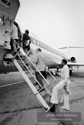 Willie Stargell boards a plane headed to the All-Star game, 1973. From the book Willie Stargell boards a plane headed to the All-Star game, 1973. From the book