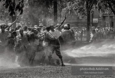 Unified resistance, Kelly Ingram Park, Birmingham 1963
Demonstrators quickly learned that by huddling together they could use their combined strength to withstand the blast of the fire hoses.