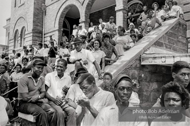 Onlookers on the steps of the 16th Street Baptist Church. Many of these people were the parents of the young people participating in the Children’s March. Birmingham, AL, 1963.