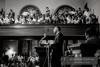 During a mass meeting at the 16th Street Baptist Church, King urges his supporters to join the demonstrations,  Birmingham,  Alabama.  1963