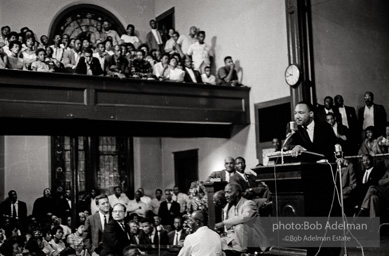 During a mass meeting at the 16th Street Baptist Church, King urges his supporters to join the demonstrations,  Birmingham,  Alabama.  1963