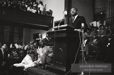 During a mass meeting at the 16th Street Baptist Church, King urges his supporters to join the demonstrations,  Birmingham,  Alabama.  1963