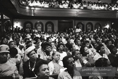 The audience responds as Martin Luther King and Ralph Abernathy speak at the 16th Stret Baptist Church. Birmingham Alabama, 1963.