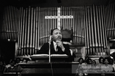 During a mass meeting at the 16th Street Baptist Church, King urges his supporters to join the demonstrations,  Birmingham,  Alabama.  1963