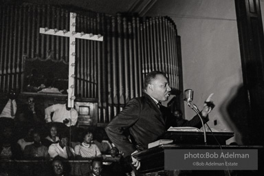 During a mass meeting at the 16th Street Baptist Church, King urges his supporters to join the demonstrations,  Birmingham,  Alabama.  1963