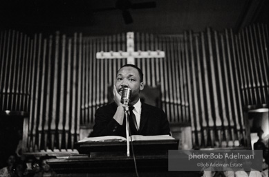 During a mass meeting at the 16th Street Baptist Church, King urges his supporters to join the demonstrations,  Birmingham,  Alabama.  1963