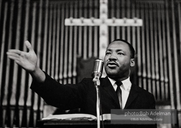 During a mass meeting at the 16th Street Baptist Church, King urges his supporters to join the demonstrations,  Birmingham,  Alabama.  1963