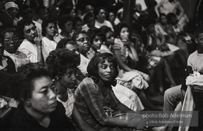 The audience responds as Martin Luther King and Ralph Abernathy speak at the 16th Stret Baptist Church. Birmingham Alabama, 1963.