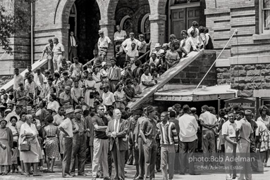 Onlookers on the steps of the 16th Street Baptist Church. Many of these people were the parents of the young people participating in the Children’s March. Birmingham, AL, 1963.