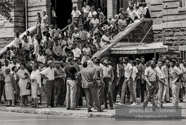 Onlookers on the steps of the 16th Street Baptist Church. Many of these people were the parents of the young people participating in the Children’s March. Birmingham, AL, 1963.