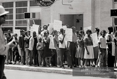 Emblimatic photograph of the Childrens Crusade. “The police had contained the demonstrations to the black part of town. But by filling the jails, the protestors immobilized the police — and the next wave of demonstrators could peacefully protest for the first time in downtown Birmingham. The jails were flooded, the city was paralyzed and the white leadership realized it had to come to the bargaining table.”  1963