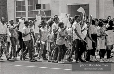 Emblimatic photograph of the Childrens Crusade. “The police had contained the demonstrations to the black part of town. But by filling the jails, the protestors immobilized the police — and the next wave of demonstrators could peacefully protest for the first time in downtown Birmingham. The jails were flooded, the city was paralyzed and the white leadership realized it had to come to the bargaining table.”  1963