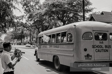 A bus full of youthful protestors heading for a detention center. Birmingham, AL, 1963.