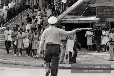 A wave of youthful protestors leaving the 16th Street Baptist Church. Birmingham Al, 1963.