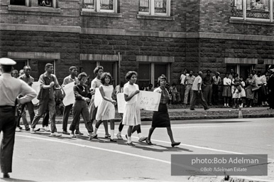 A wave of youthful protestors leaving the 16th Street Baptist Church. Birmingham Al, 1963.