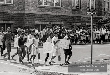 A wave of youthful protestors leaving the 16th Street Baptist Church. Birmingham Al, 1963.