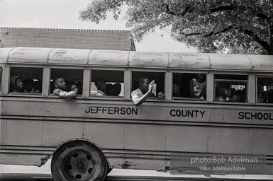 A bus full of youthful protestors heading for a detention center. Birmingham, AL, 1963.