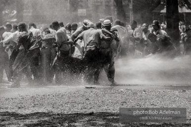 Demonstrators hold onto each other to face the spray, Kelly Ingram Park, Birmingham 1963