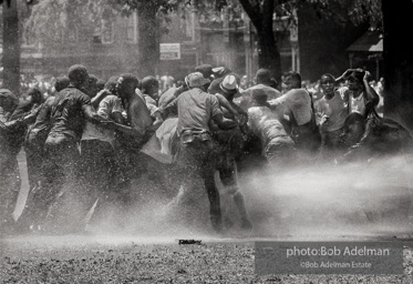 Unified resistance, Kelly Ingram Park, Birmingham 1963
Demonstrators quickly learned that by huddling together they could use their combined strength to withstand the blast of the fire hoses. Unified resistance, Kelly Ingram Park, Birmingham 1963
Demonstrators quickly learned that by huddling together they could use their combined strength to withstand the blast of the fire hoses.