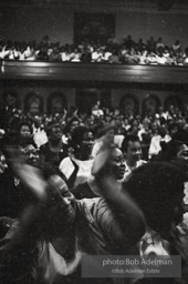 The audience responds as Martin Luther King and Ralph Abernathy speak at the 16th Stret Baptist Church. Birmingham Alabama, 1963.