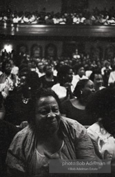 The audience responds as Martin Luther King and Ralph Abernathy speak at the 16th Stret Baptist Church. Birmingham Alabama, 1963.