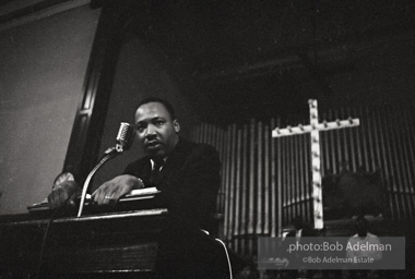 During a mass meeting at the 16th Street Baptist Church, King urges his supporters to join the demonstrations,  Birmingham,  Alabama.  1963