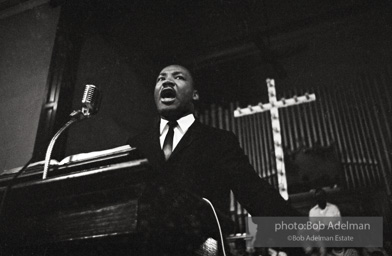 During a mass meeting at the 16th Street Baptist Church, King urges his supporters to join the demonstrations,  Birmingham,  Alabama.  1963