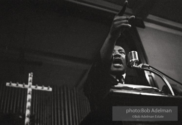 During a mass meeting at the 16th Street Baptist Church, King urges his supporters to join the demonstrations,  Birmingham,  Alabama.  1963