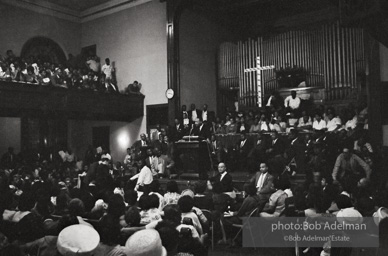 During a mass meeting at the 16th Street Baptist Church, King urges his supporters to join the demonstrations,  Birmingham,  Alabama.  1963