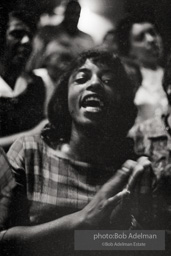 The audience responds as Martin Luther King and Ralph Abernathy speak at the 16th Stret Baptist Church. Birmingham Alabama, 1963.