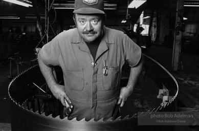 Jim Burton, a saw filer with Boise-Cascade, in the room where Carver’s father worked. (1989)