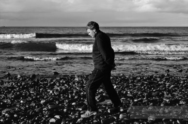 Raymond Carver on the beach below Sky House, Strait of Juan de Fuca, Washington. (1984)