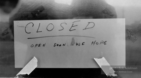 Sign in store window, Port Angeles, Washington. (1989)