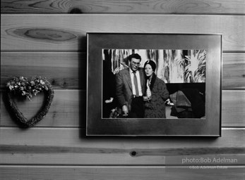 Photograph of Ray and Tess at Harvard University, on display in the room where Carver died, Ridge House, Port Angeles, Washington. (1989)