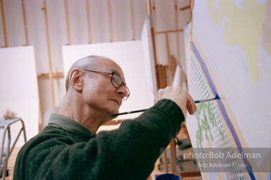 Roy Lichtenstein at work on his painting Interior with Ajax. 1997.-photo©Bob Adelman, artwork ©Estate of Roy Lichtenstein