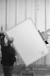 Roy Lichtenstein, while working on his painting Interior with Woman Leaving. 1996.-photo©Bob Adelman, artwork ©Estate of Roy Lichtenstein