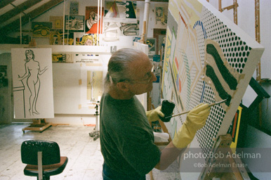 Roy Lichtenstein at work on his Interior with Painting and Still Life. 1997.-photo©Bob Adelman, artwork ©Estate of Roy Lichtenstein