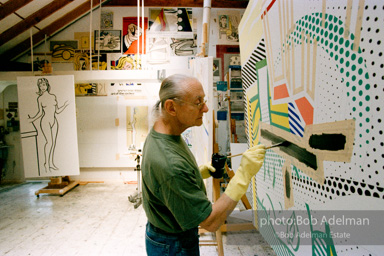 Roy Lichtenstein at work on his Interior with Painting and Still Life. 1997.-photo©Bob Adelman, artwork ©Estate of Roy Lichtenstein